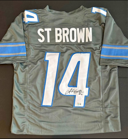 🏈AMON RA ST. BROWN signed/autographed jersey w/ Beckett COA